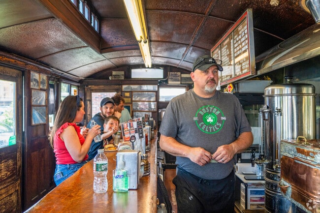 Casey's Diner in Natick is a compact, landmark in operation since 1890 serving steamed hotdogs.
