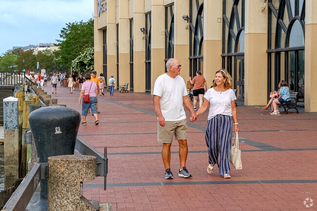 Residents enjoy an evening stroll along the Savannah River near Benjamin Van Clark.