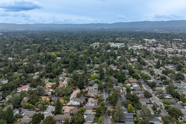 An aerial view of North Fair Oaks showcases its lush greenery and cozy homes.