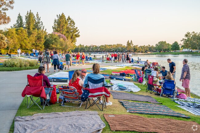 Attendees put out the chairs and blankets for the fireworks at the Star Spangled Spectacular in the City of Rancho Santa Margarita.