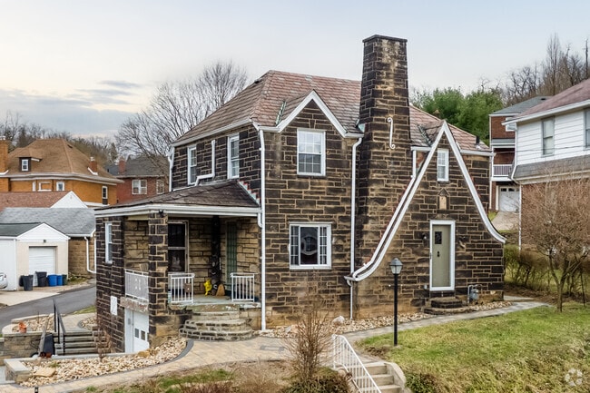 Tutor Revival homes can be found around the Forest Hills area.