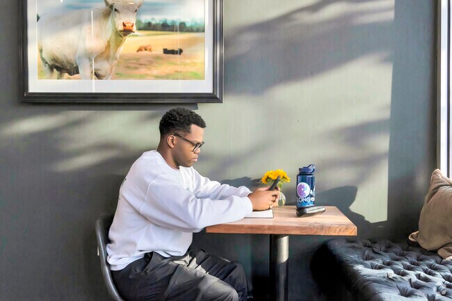 The River Coffee Company serves up delicious brews in a cozy setting, perfect for relaxing.