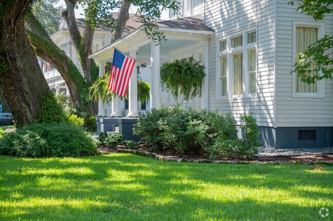 Lyons Park in Mobile features homes shaded by century-old live oak trees.