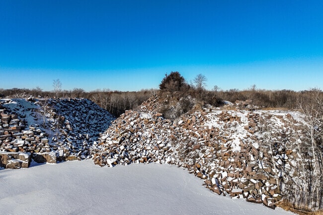 Quarry Park and Nature Preserve in St. Cloud features rustic hiking trails, rock climbing, and quarry swimming.