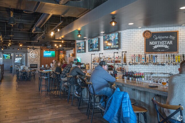 Cozy up to the bar at NorthStar Tavern for a wide selection of tap beers and craft cocktails.