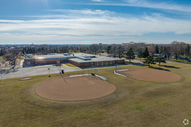 There are baseball fields at Armstrong Elementary.