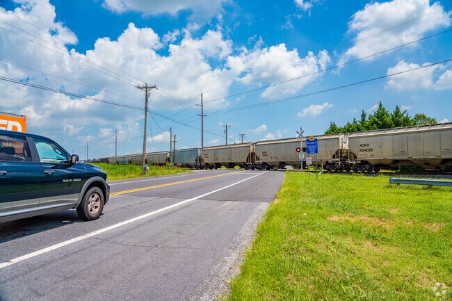 When trains roll through, traffic pauses briefly at the intersection roads in Wyoming.