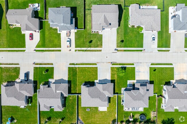 New Traditional homes in Ashland have driveways and sidewalks.