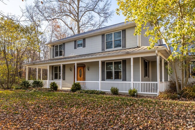 This beautiful home in Goshen features a wraparound porch.