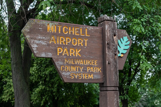 Watch the planes take off from Mitchell Airport Park in Town of Lake.