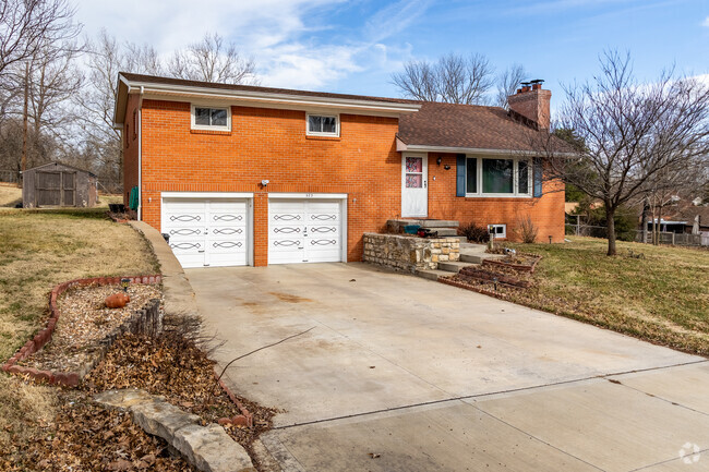 Brick homes with two car garages are commonly found in the Muncie neighborhood.