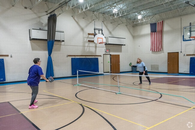 Greenbriar's community center features a well-loved pickleball court for residents of all ages.