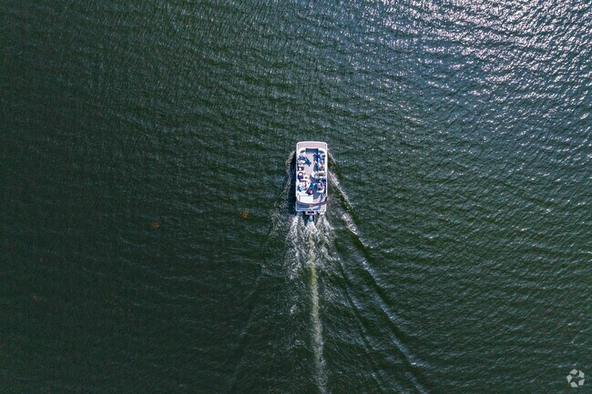 Aerial view of boat cruising on Lake Hopatcong.