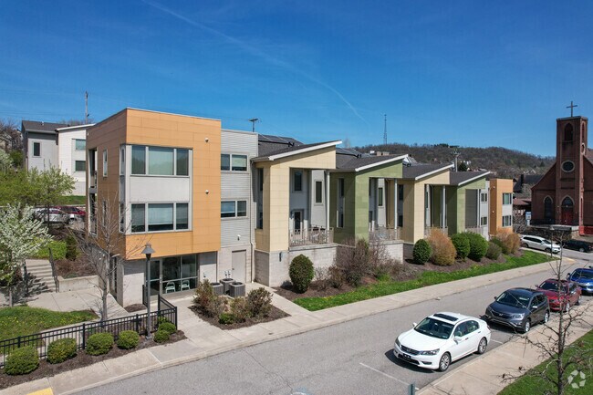 Modern new builds stand out amongst Braddock's old four squares.