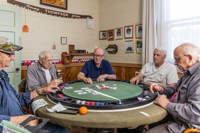 A Ryderwood men's group meets every Monday for a friendly card game.