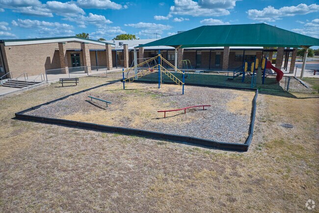 The jungle gym at Pflugerville Elementary School is a popular spot during recess.