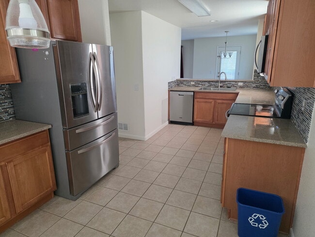 7514 S Quatar Way, Aurora, CO 80016 - photo 2