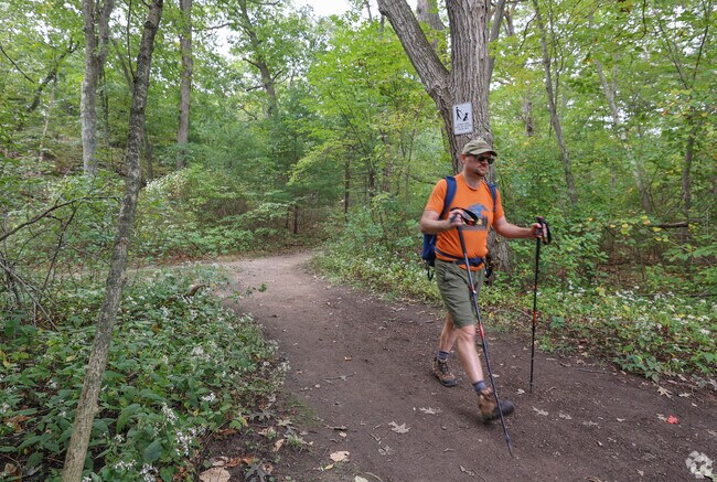 Hikers enjoy the different trails within the Middlesex Fells Reservation in Oak Grove-Pine Banks area.