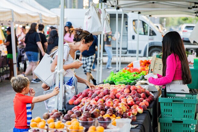 Meanwhile the farmers market is happening right outside of Music in Park.