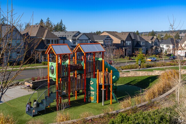 Families enjoy the modern playgrounds at Roshak Park.