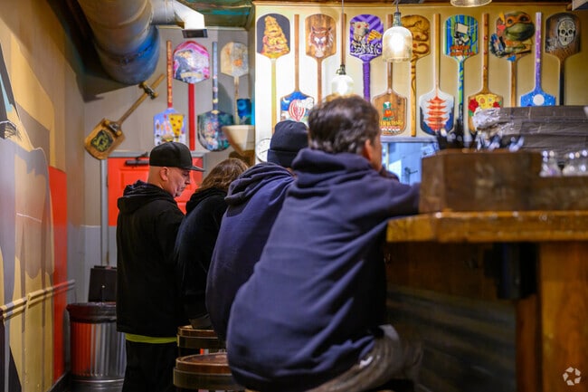 Grab a slice of pizza or sit at the bar at Benny Vitali's in Mayfield.