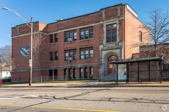 A local bus stop in front of Reservoir Avenue Elementary School located in Providence.