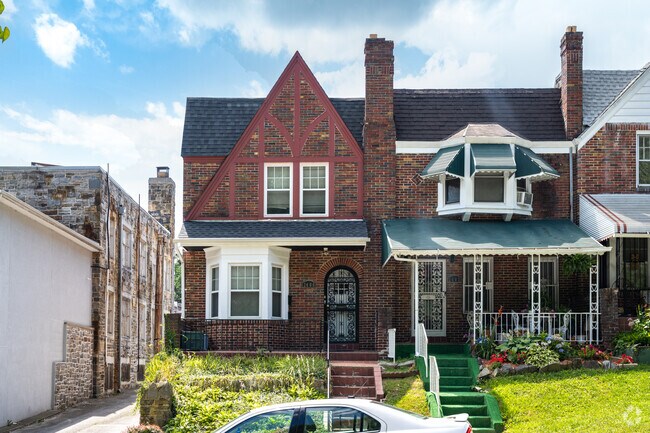 Live in a beautiful tudor style row home in Walbrook.