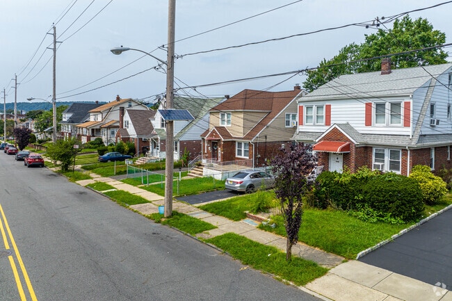 South Paterson has many neighborhoods with grass front lawns and driveways.