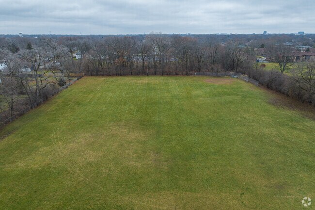 The large open field at Lincoln Elementary School invites free play and imagination.