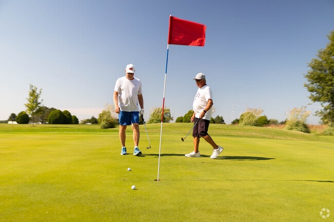 Golfers refine their short game at Hillsboro Municipal Golf Course near downtown.
