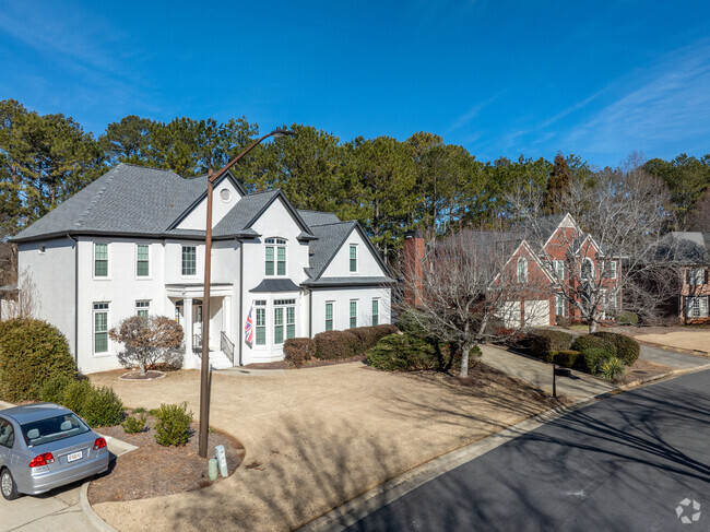 Larger estates line the roads of the East Hampton community in Roswell, GA.