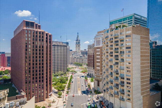 Benjamin Franklin Parkway leads past tall condos from Logan Square to the iconic City Hall.