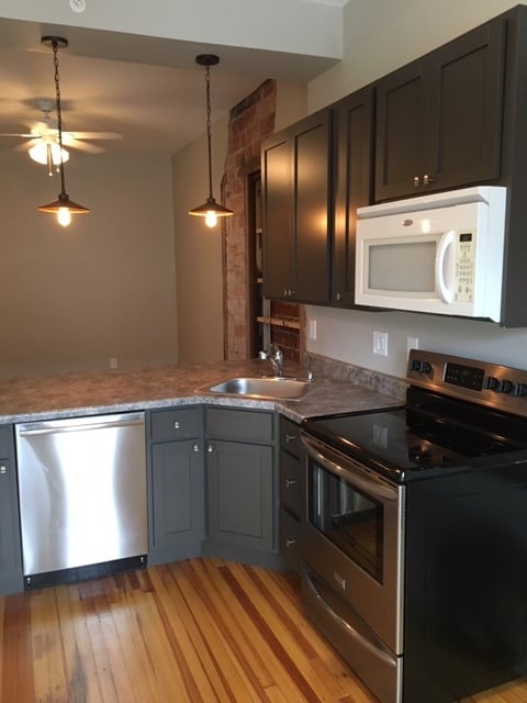 Kitchen looking into living room