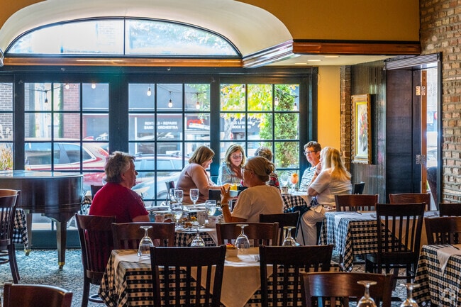 Patrons of Suzette's Crêperie enjoy their meal in Downtown Wheaton.