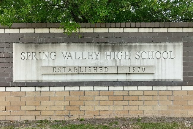 The plaque at the entrance of the Spring Valley High School
