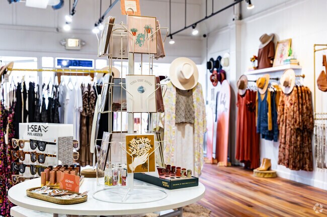 Shop around clothing boutiques in Business District like Flower Wild.