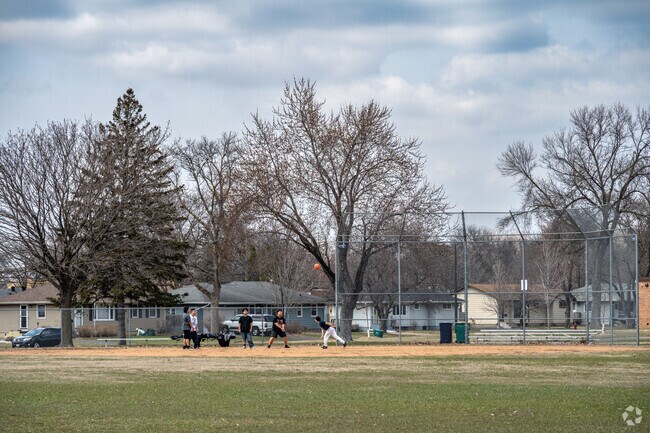 Residents enjoy the open spaces of the sports fields at Willow Lane Park.