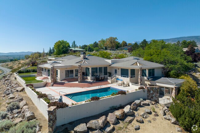 Bartley Ranch is a wealthy community boasting large residences with pools on vista points.