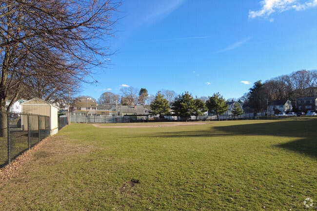 Play baseball or a game of kickball during gym class on the Forestdale School's diamond.