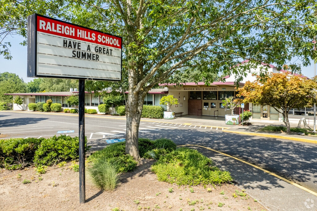 Raleigh Hills Elementary School sign welcomes students to the school.
