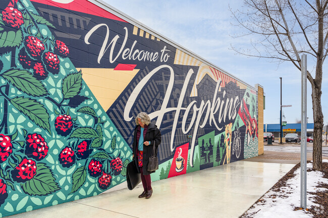 Avenues West's brilliant murals welcome you to the heart of Hopkins.