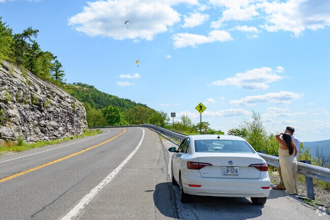 While admiring the view from the Rt 52 lookout, be sure to look for paragliders above.