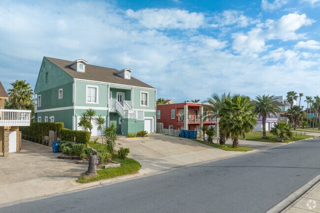 Two-story duplex condominiums line central South Padre Island.