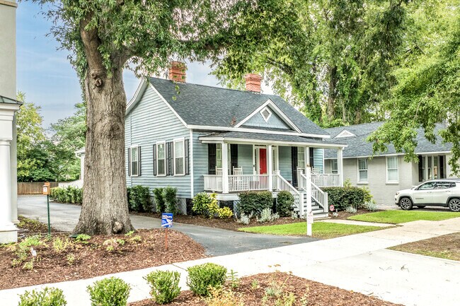 he side-gabled roof of this Craftsman cottage adds charm to the Robert Mills neighborhood.