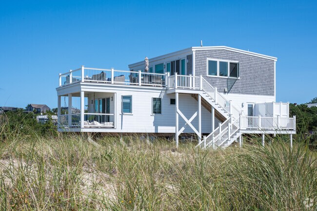 Many homes in Truro are raised for protection from storm surges.