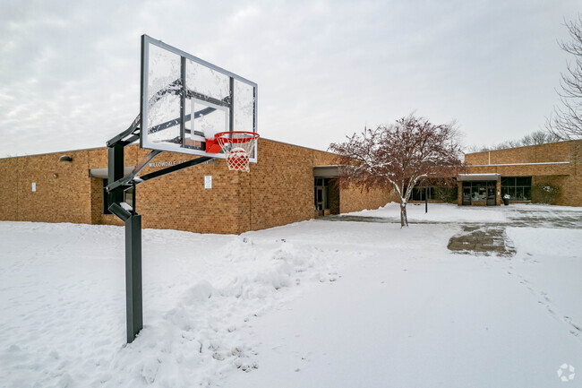 Willowdale Elementary School has basketball hoops.