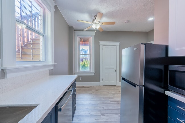 view from kitchen into open concept living room