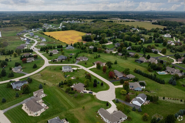 Lisbon's suburban streets feature homes spaced out by large yards and occasional farmland.