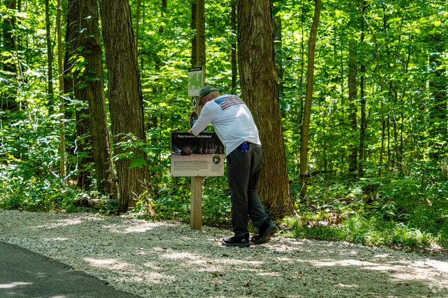 Maybury State Park has shoe cleaners at the trailhead to stop invasive hitchhikers.
