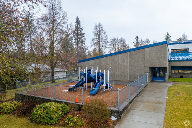 Roosevelt elementary features a small playground on the side of the building.